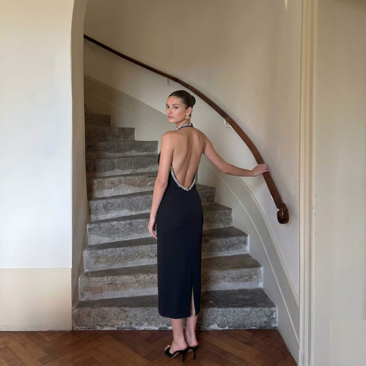 Black High-Neck Dress with Elegant Jewelry