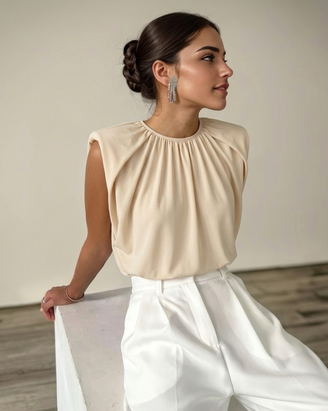 Elegant Cream-Colored Sleeveless Bodysuit