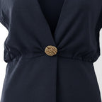 Elegant Long Black Two-Piece Set with Gold Accessory